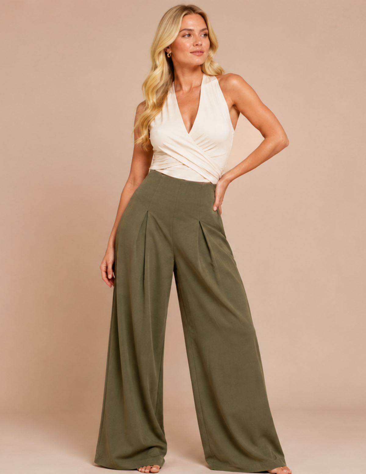 LARA wide leg high waist pants sewing pattern shown on a woman, featuring front inverted pleats and flowing legs