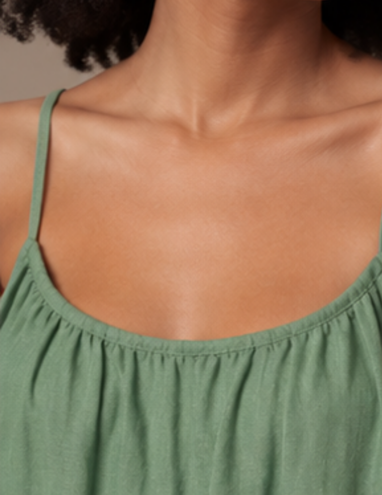Close-up of the 
gathered neckline and 
delicate shoulder 
straps on the 
Amazonie maxi dress 
sewing pattern
