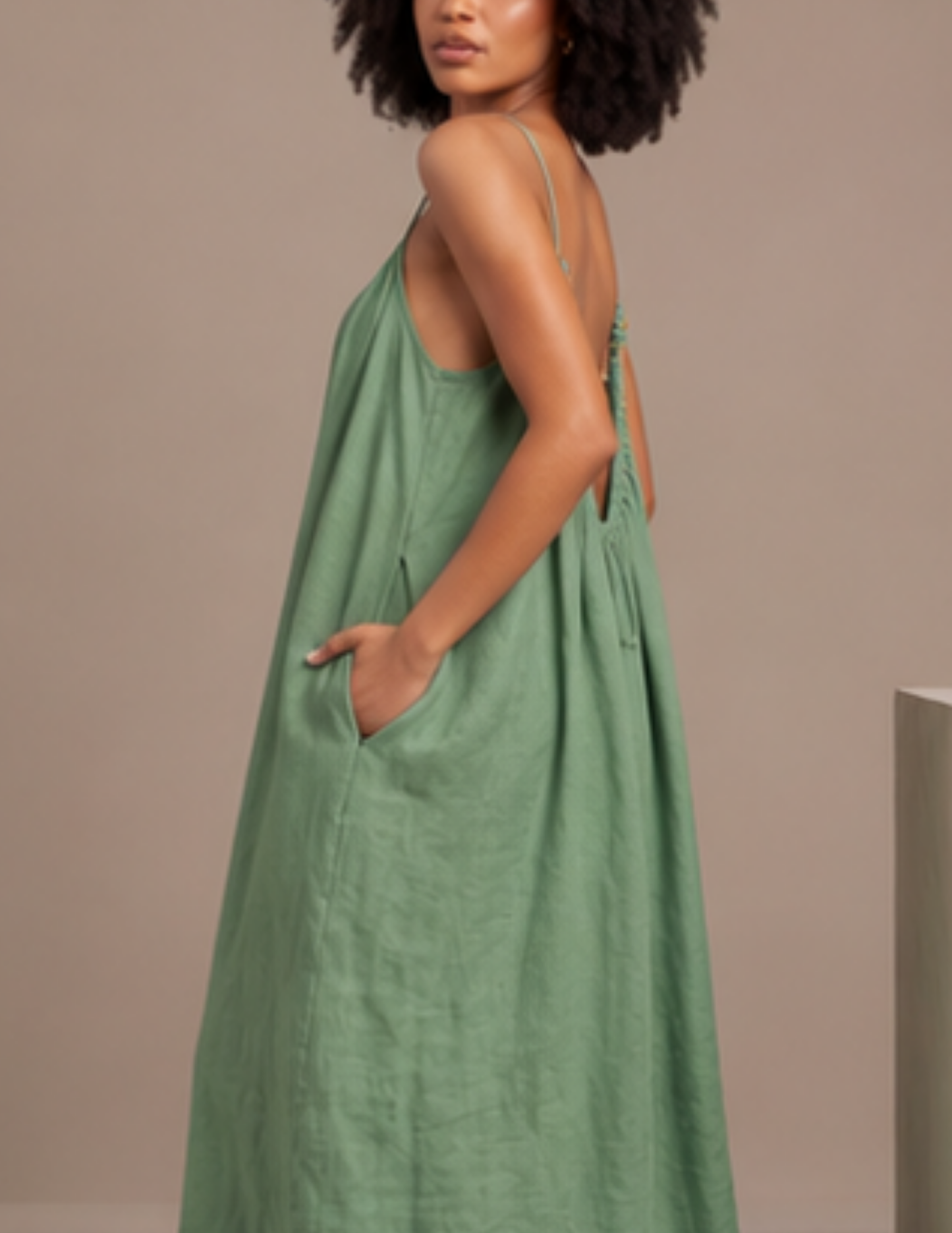 Amazonie maxi dress 
sewing pattern 
featuring practical side 
pockets, open back 
design and relaxed 
summer silhouette