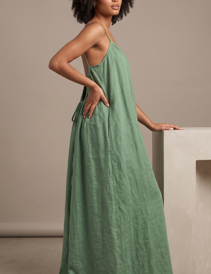 Side view of the 
Amazonie summer 
 maxi dress showing 
the loose fit, flowing 
skirt and lightweight 
linen style.
