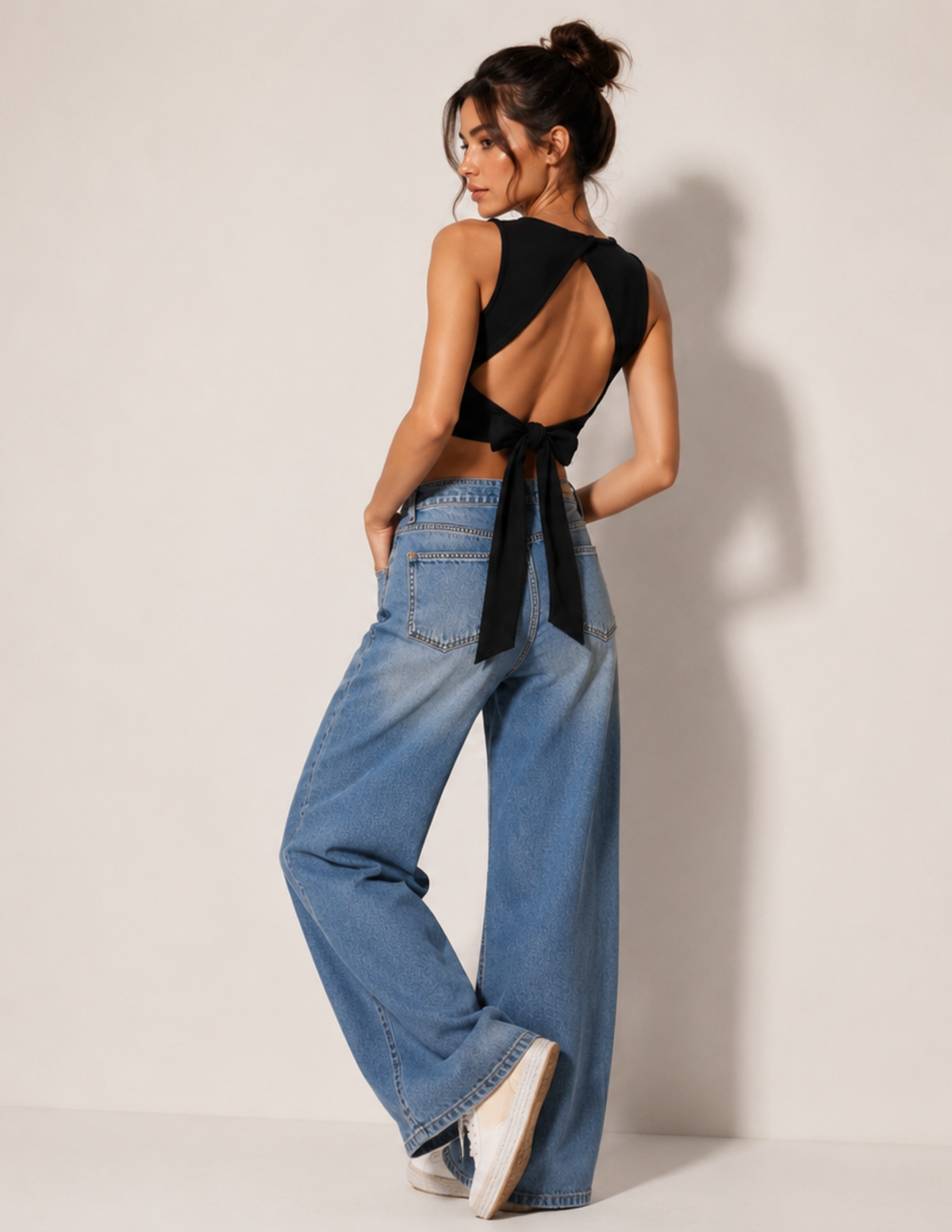 Calypso Top sewing pattern close-up showing the crossover open back, long waist ties and bow detail