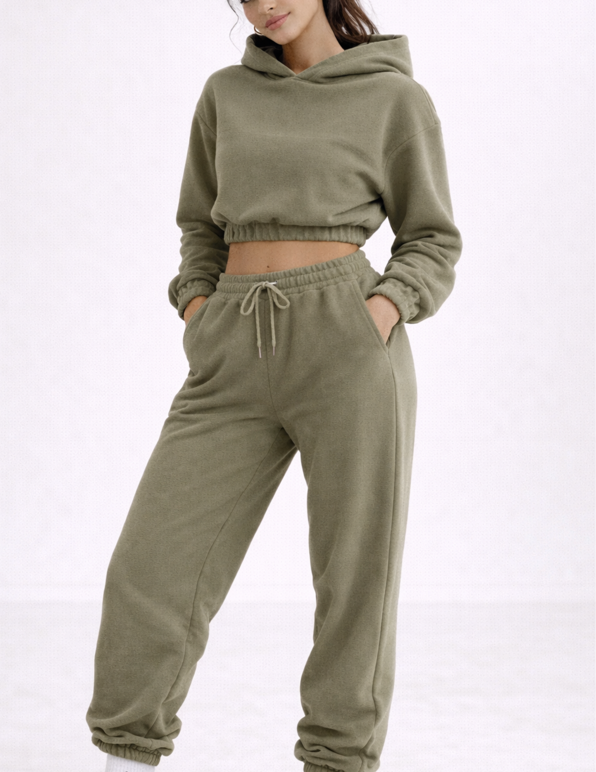 Close-up of the EBONY cropped hoodie showing the relaxed fit, elastic hem and matching jogger pants.