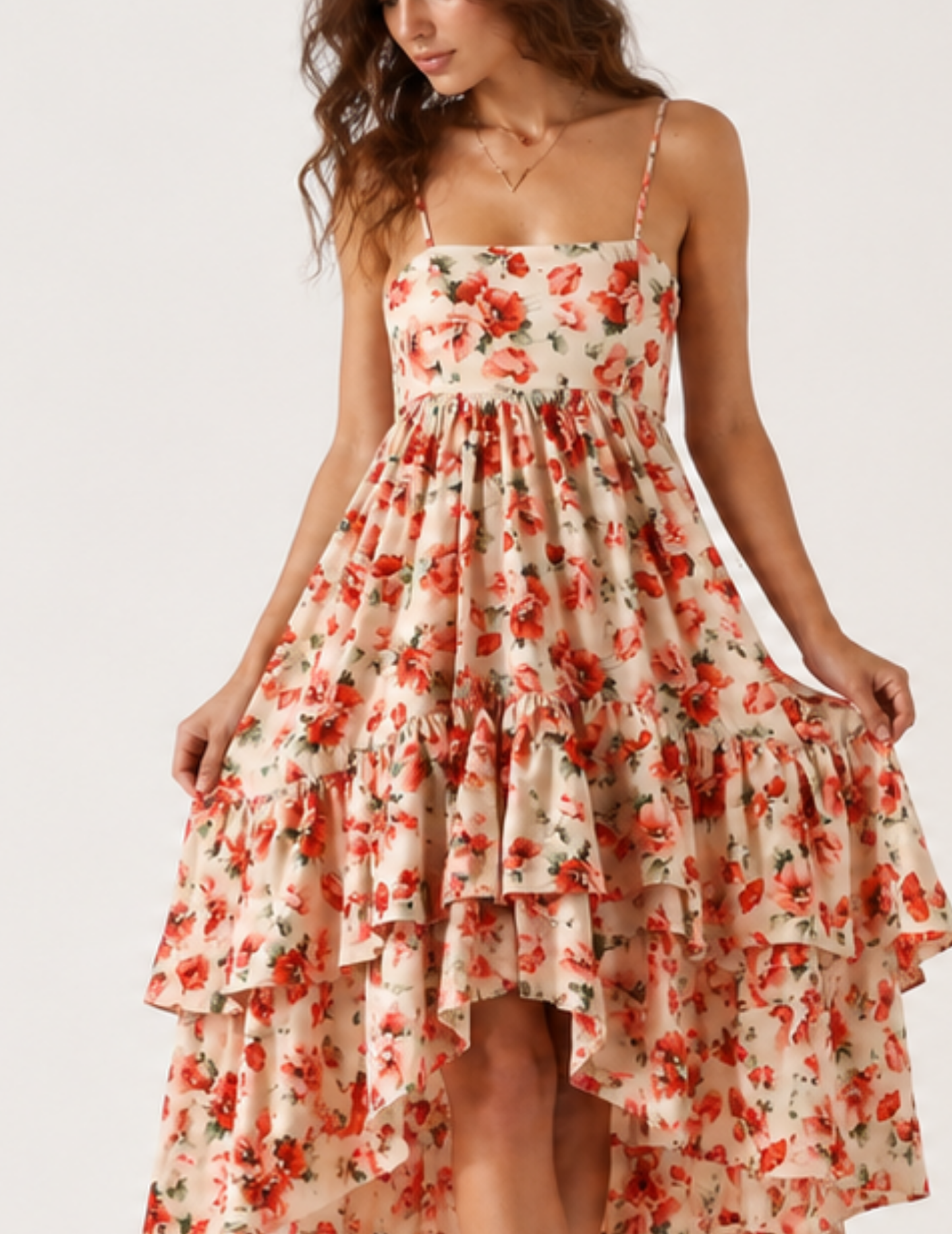 Woman wearing a floral dress with a white background
