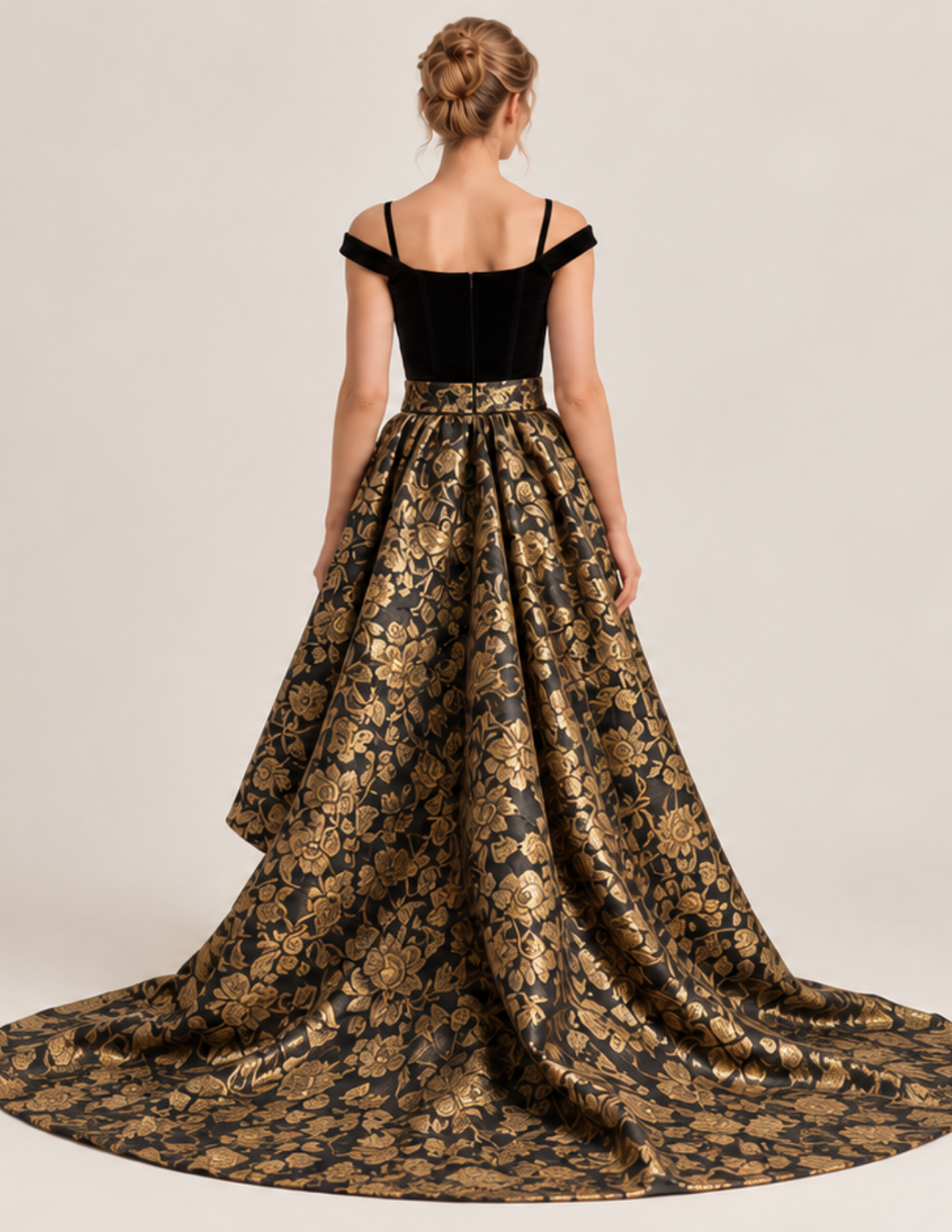Back view of the ODETTE circle skirt showing its full-length gold brocade train, gathered waist, and fl owing fabric extending onto the fl oor.