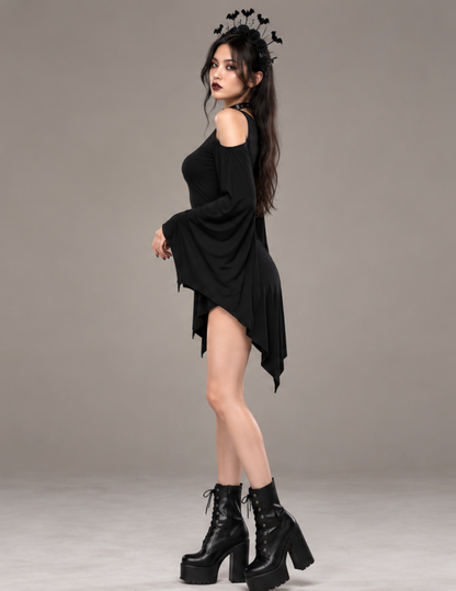 Side view of the black Raven gothic bat wing 
dress with flowing bat-inspired sleeves, exposed 
shoulders and an asymmetrical hem, styled 
with black platform boots for a dramatic 
Halloween look
