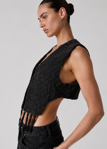 Side view of the Women's Cropped 
Open Front Vest Sewing Pattern PDF 
showing the asymmetrical front 
and sleeveless tailored silhouette